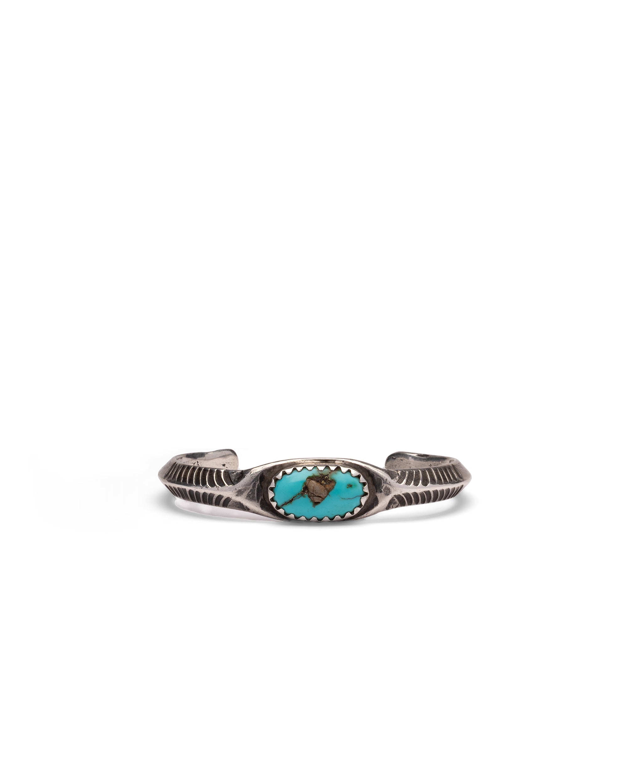 Silver bracelet with Oval Turquoise Stone and Chiseled Details