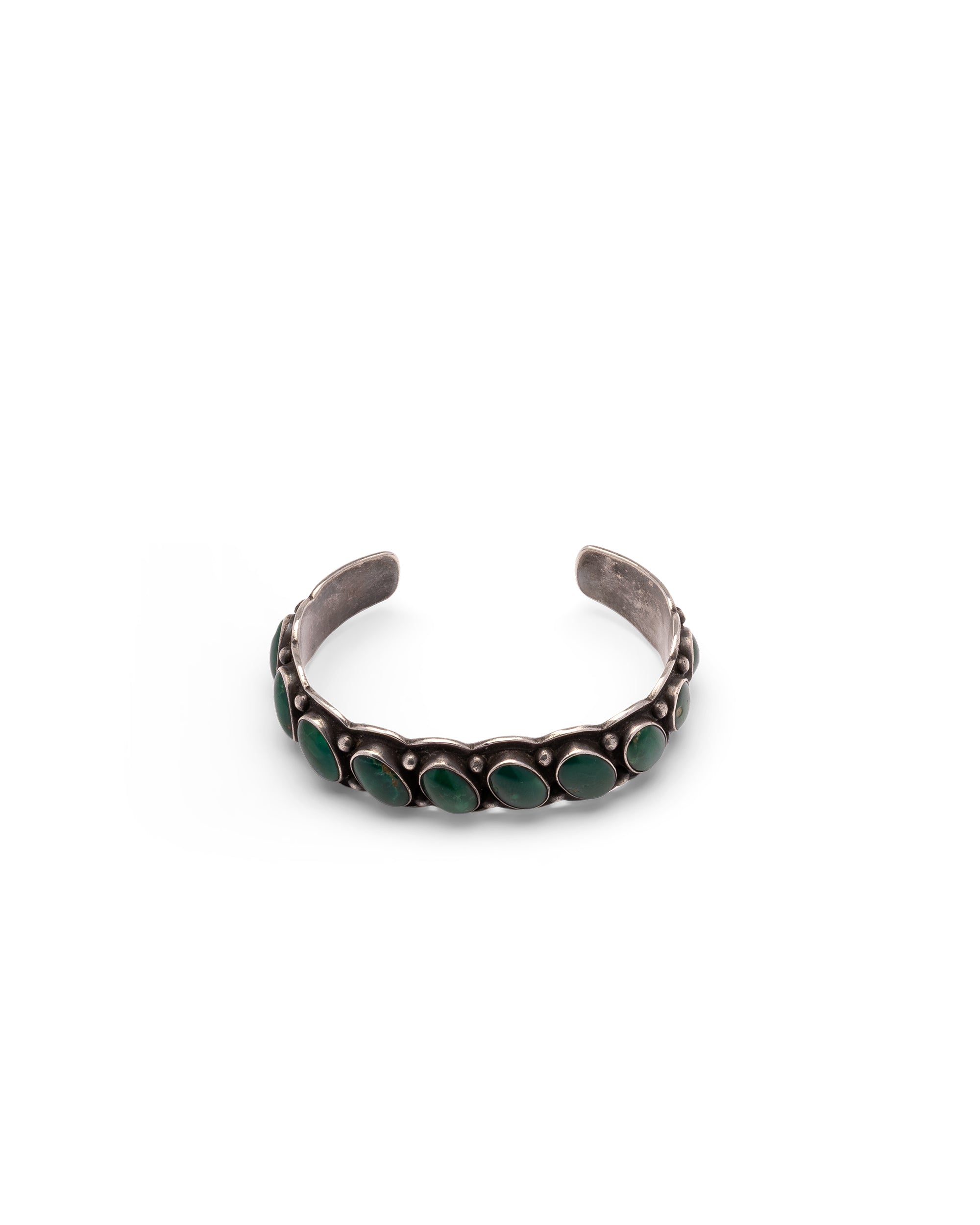 Silver bracelet with row of Oval Turquoise Stones