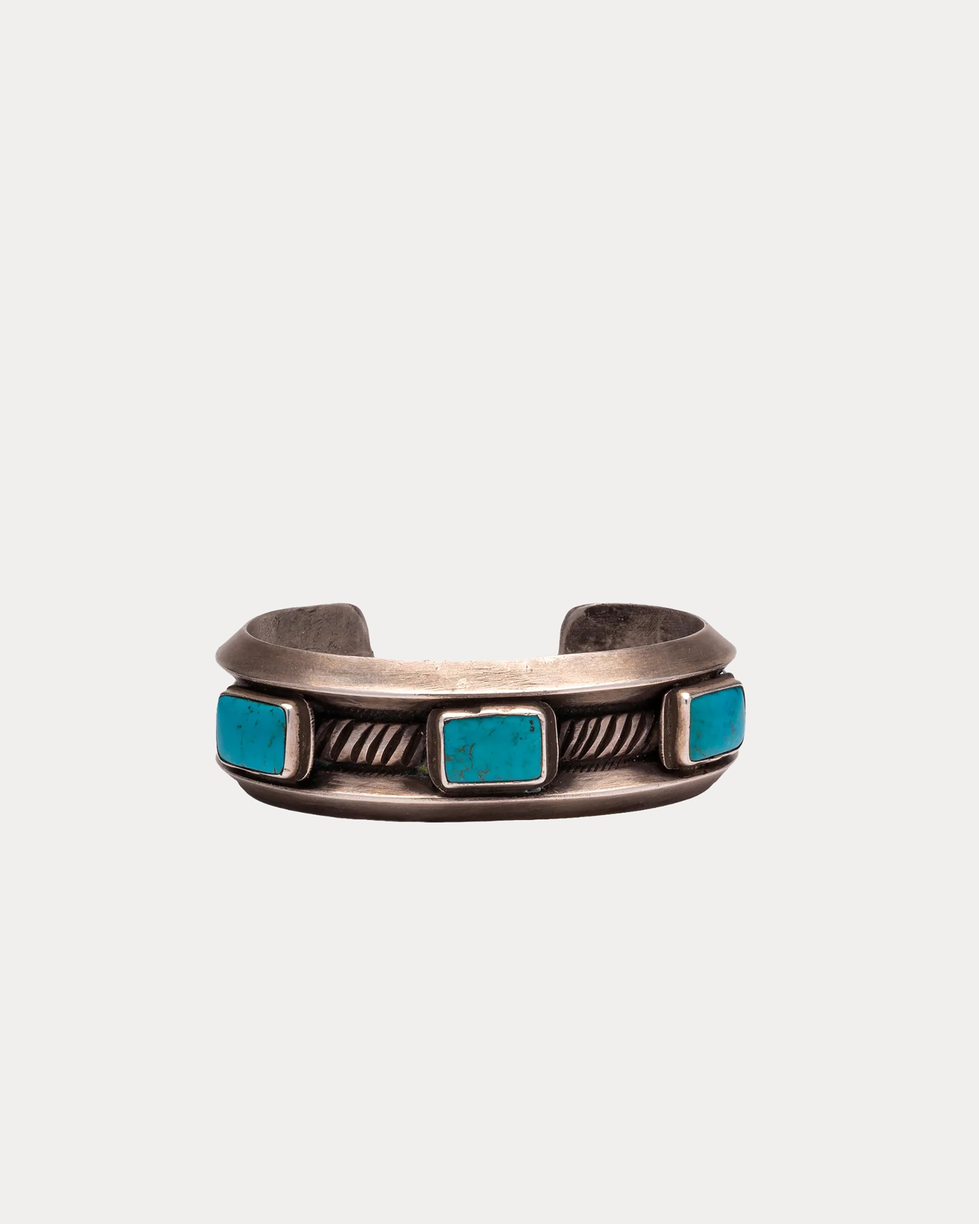Bracciale in Argento con Pietra Turchese Quadrata e decorazioni Laterali