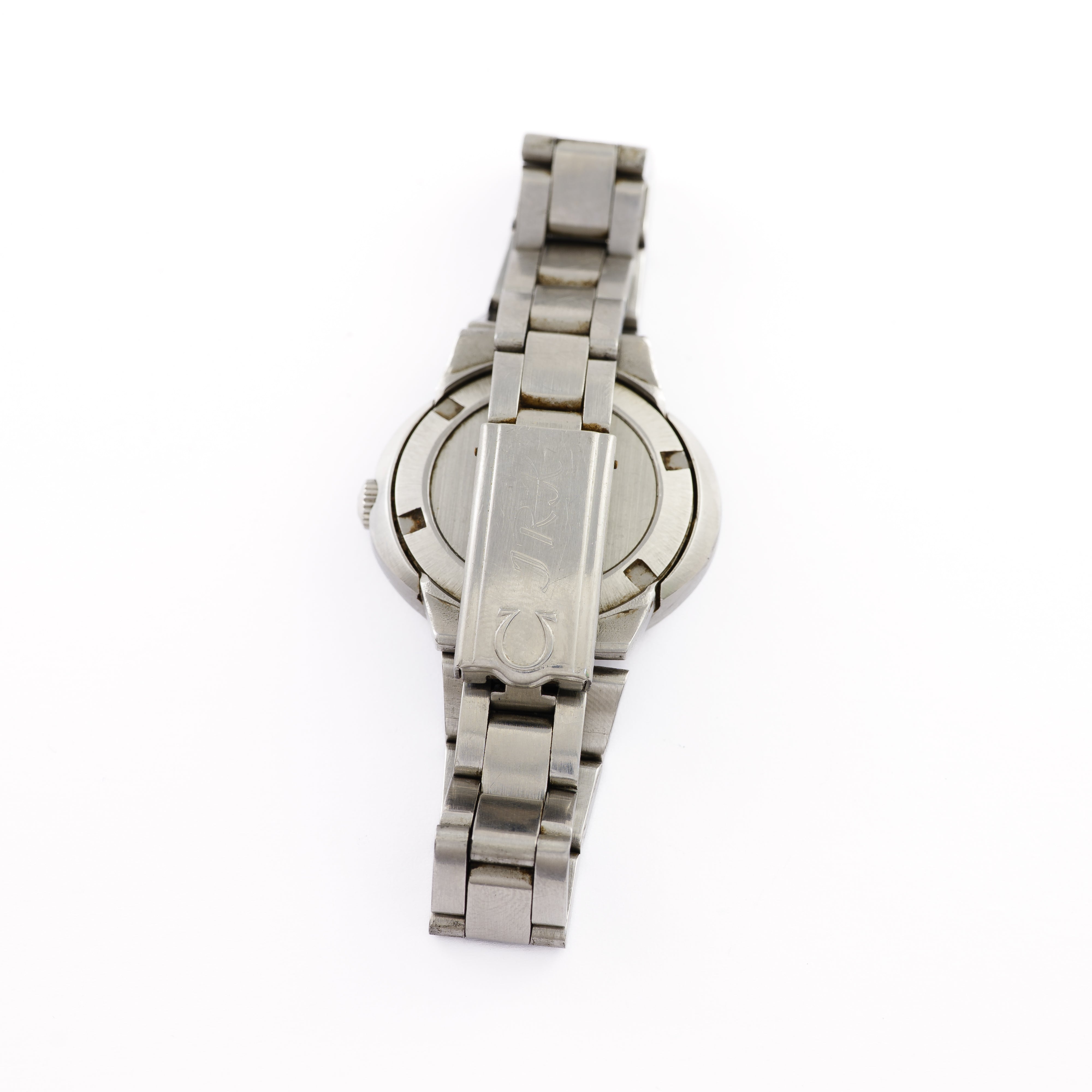 Omega Dynamic with a disc-shaped stainless steel case