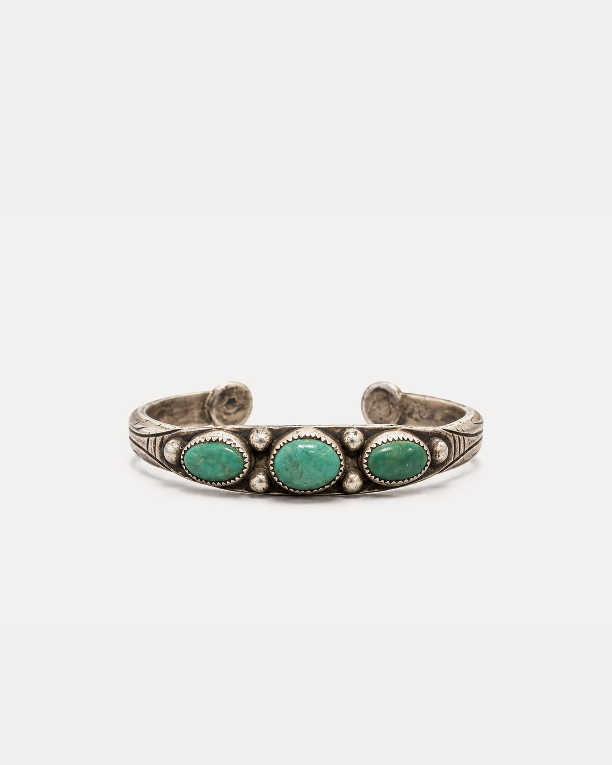 Chiseled Silver Bracelet with Oval Green Turquoises