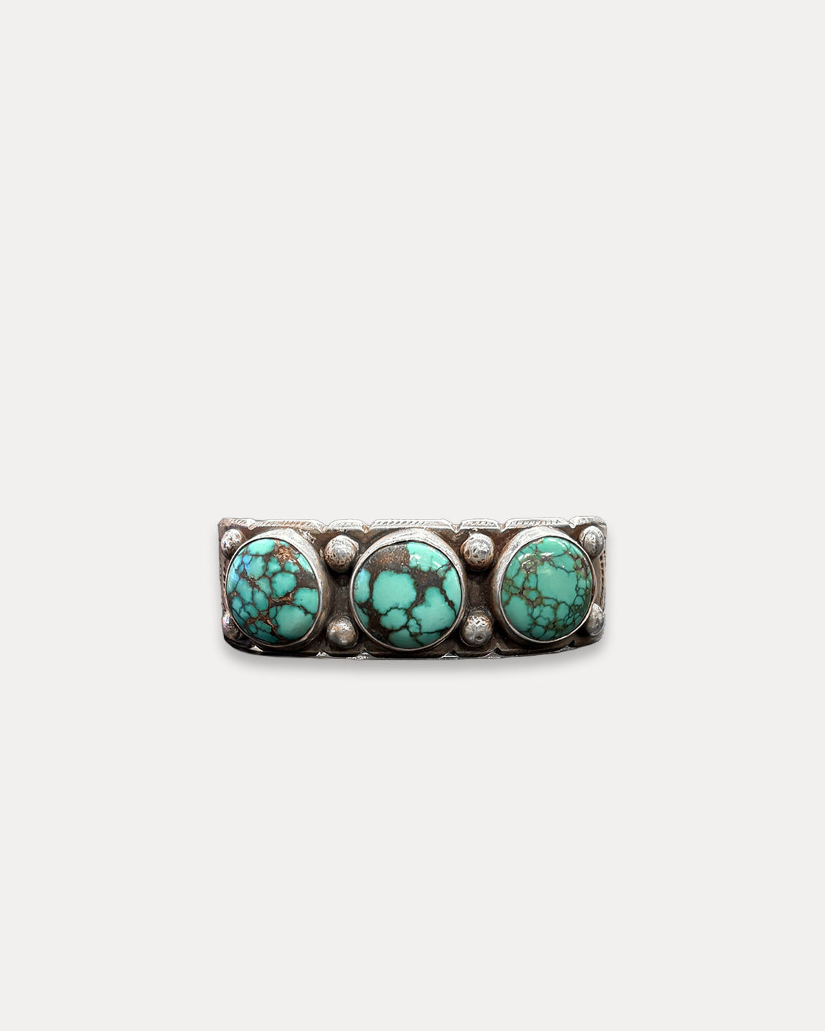 Chiseled Silver Bracelet with Speckled Turquoises