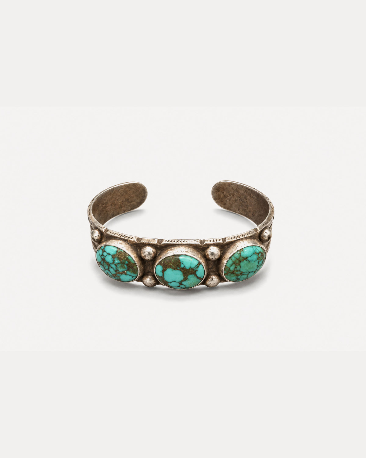 Chiseled Silver Bracelet with Speckled Turquoises