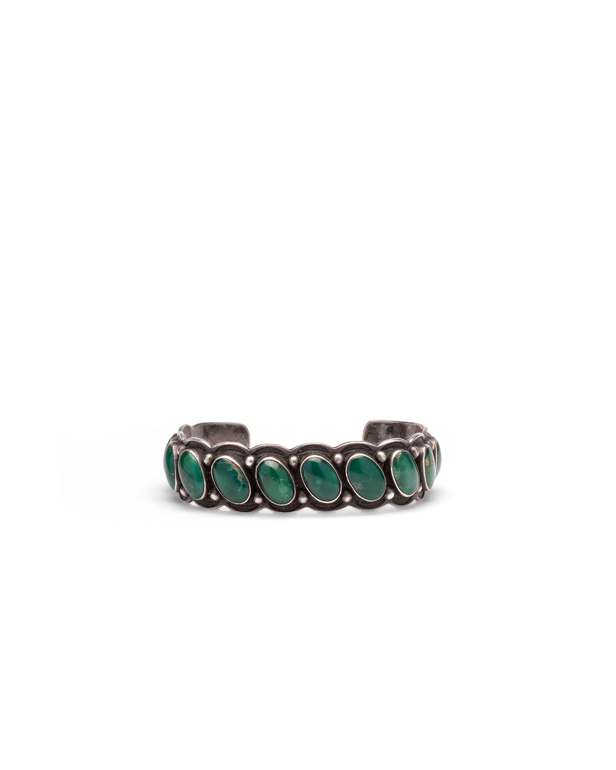Silver bracelet with row of Oval Turquoise Stones