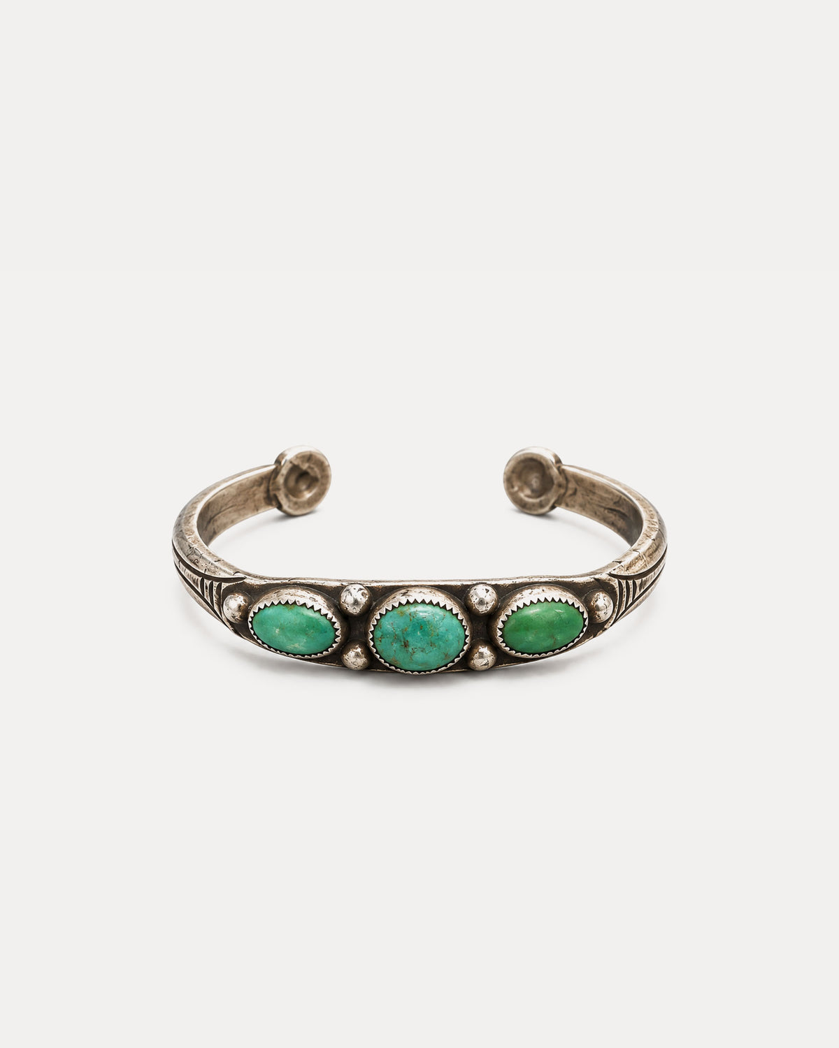 Chiseled Silver Bracelet with Oval Green Turquoises